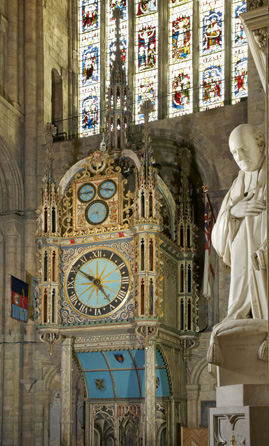 Detail of the upper section of the Cathedral clock. Apart from two medieval pews remaining in the building, this is the oldest wooden element.
